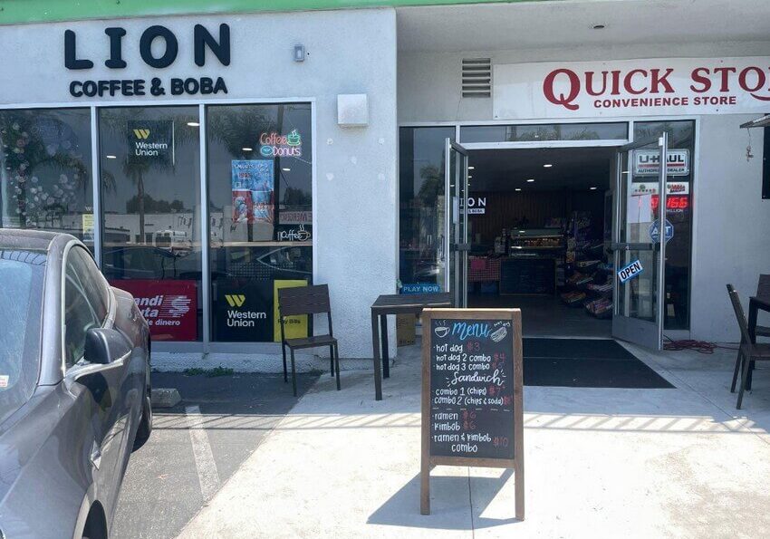 A convenience store on the corner offers snacks and sundries nearby.