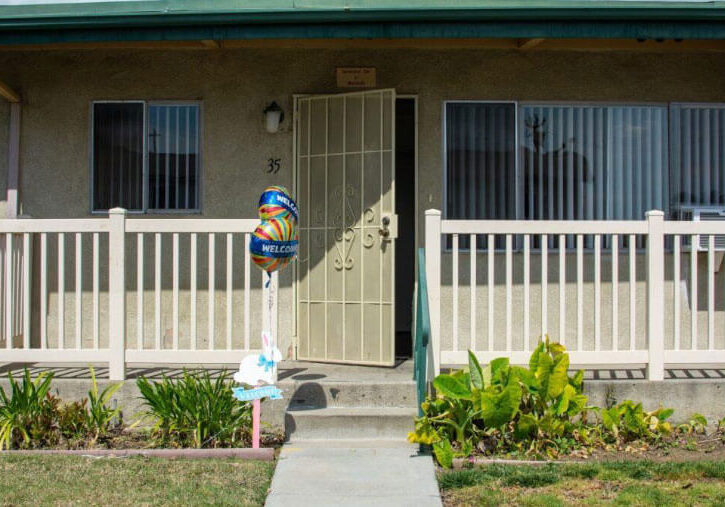A picket fence welcomes a new resident to Soroptimist Village